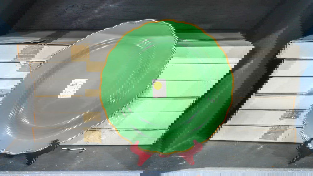 A set of twelve Anna Weatherley Designs porcelain green charger plates: A set of twelve Anna Weatherley Designs porcelain green charger plates, 12.5"dia [12 total]