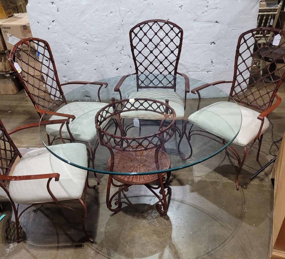 An outdoor patio set with lattice back chairs (1 of 2)