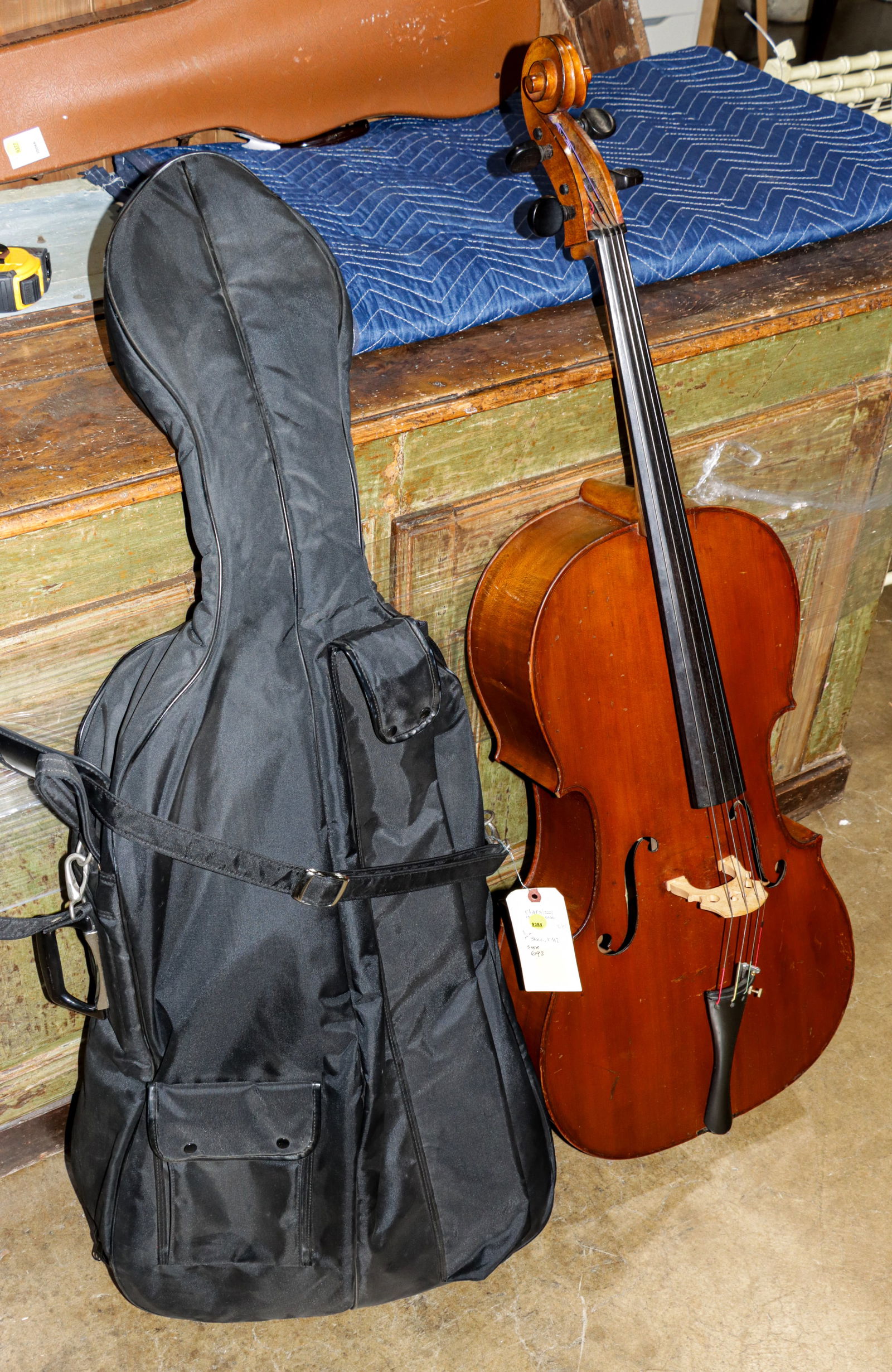 A French full size cello: A French full size cello, labeled 'Adolph Durenzy' and lyre and cello mark over 'Trademark depose' for Laberte-Humbert Freres workshop, includes soft case, 47"l (overall); 30"l (body)