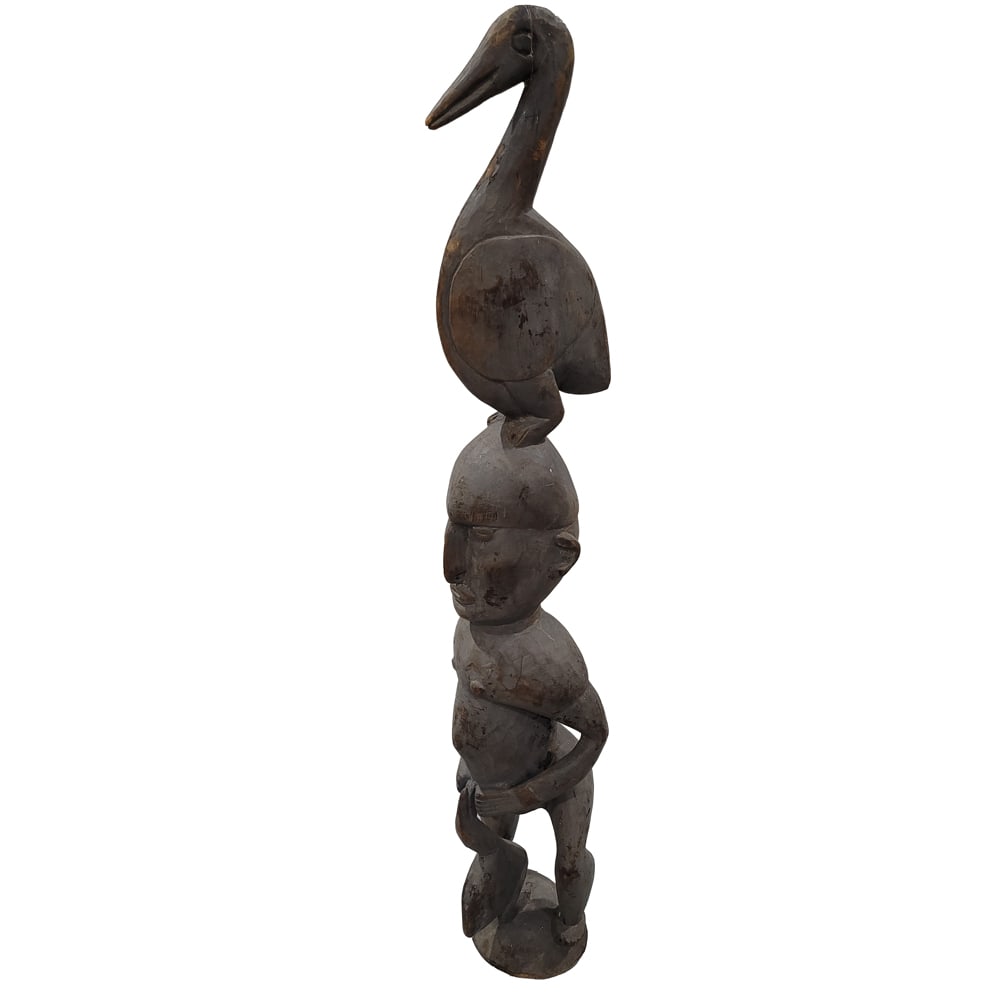 An Oceanic wood figure: An Oceanic wood figure, Papua New Guinea, approx 45"h x 8"w x 6"d