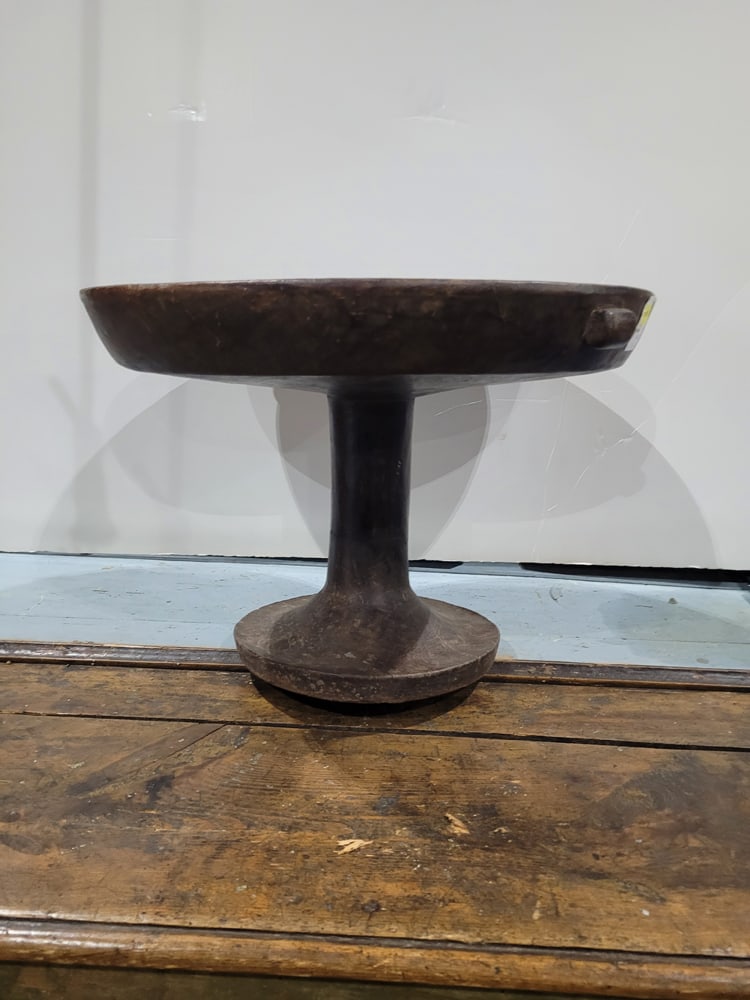 A North African wood pedestal dish: A North African wood pedestal dish, Ethiopia, approx 14"h x 20"dia