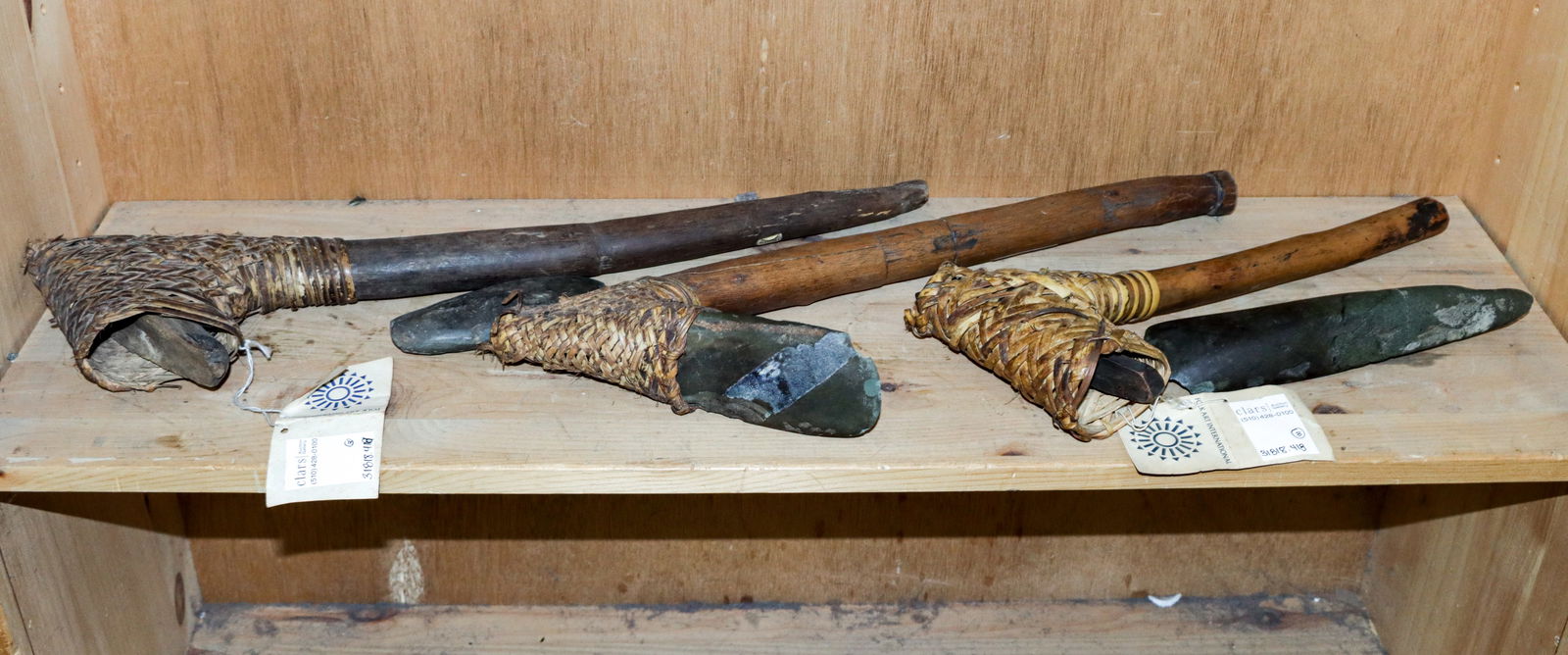 Three Oceanic stone and wood axes: Three Oceanic stone and wood axes, May River, Sepik, between 14.5"l and 21.25"l