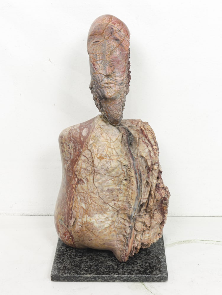 A Phil Jensen, 'Metamorphosis' Carved Stone Sculpture on Granite Base: A Phil Jensen, 'Metamorphosis' carved stone sculpture on granite base, 12.5"h (overall); 5.75"sq (base)