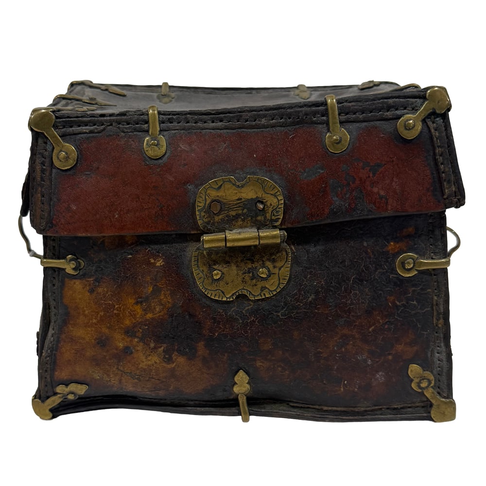 A Tibetan leather bag: A Tibetan leather bag. 5.75" high.