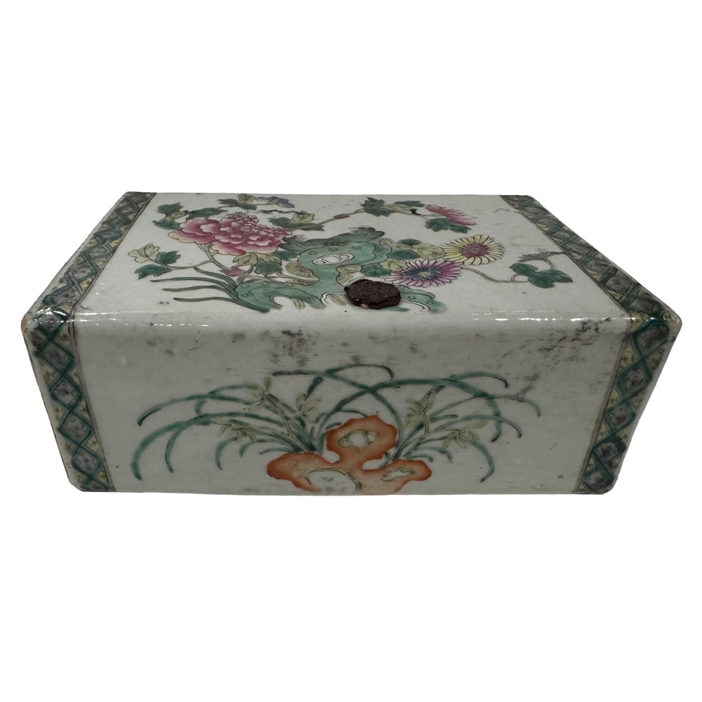 A Chinese famille rose headrest: A Chinese famille rose headrest. Featuring peonies and birds design, Republic period, 8.5" across.
