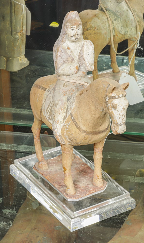 A Chinese painted terra cotta figure of a foreigner on horse (1 of 1)