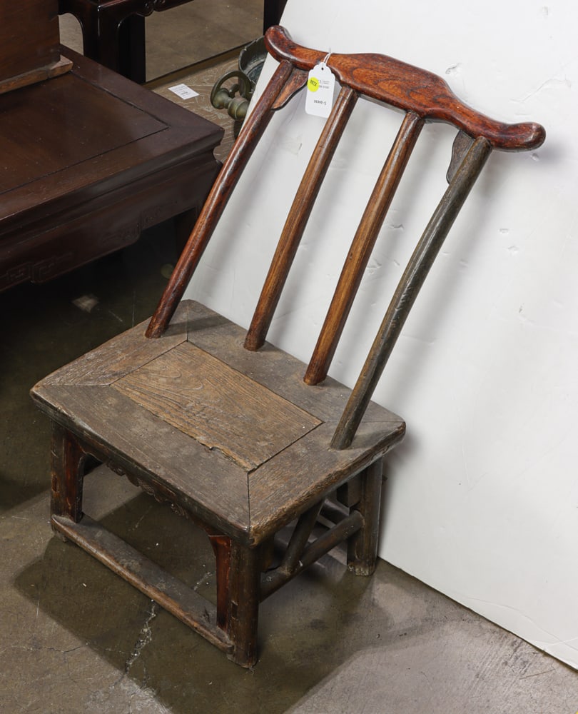 A Chinese elm child's chair: A Chinese elm child's chair. 19th century, 24"h x 15.75"w.