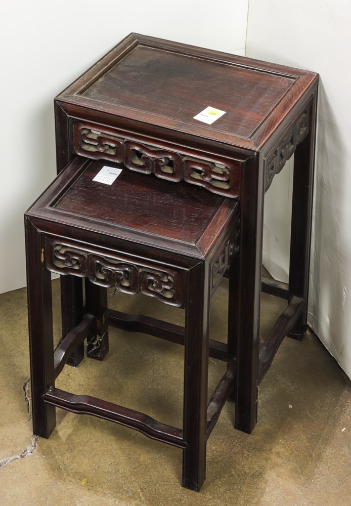 A set of two Chinese hardwood nested tables: A set of two Chinese hardwood nested tables. Republic period, 16" and 20.25" high.