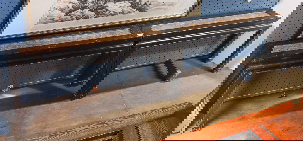 A pair of Chinese elm wood benches: A pair of Chinese elm wood benches. 18th century, 19.5"h x 43"w x 10"d.