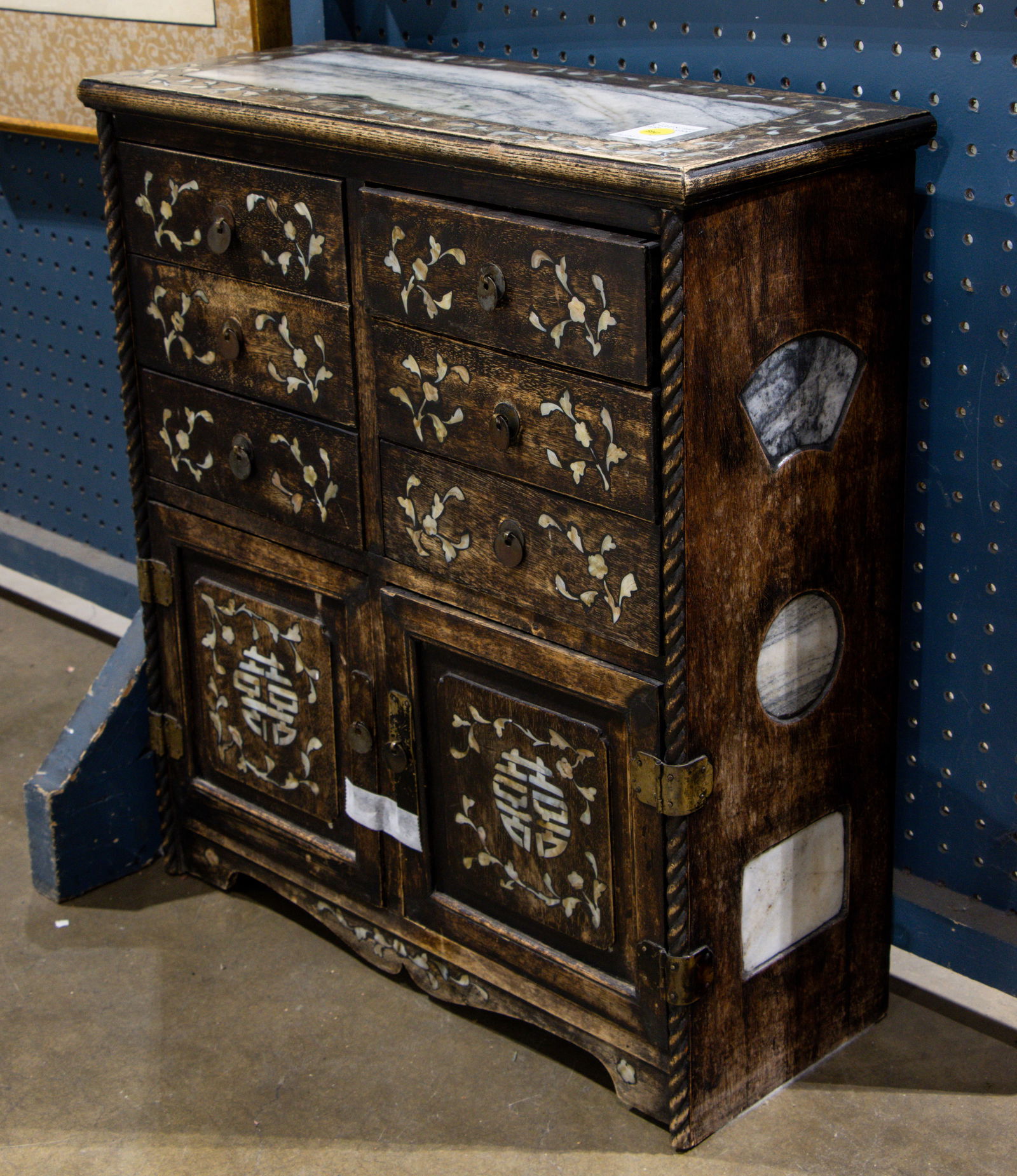A Chinese mother of pearl and marble inlaid wedding cabinet: A Chinese mother of pearl and marble inlaid wedding cabinet. Republic period, 22.5"h x 19.875"w x 8.25"d.