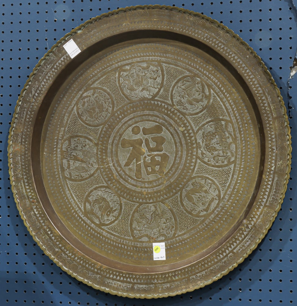 A Chinese brass platter: A Chinese brass platter. Republic period, 30" wide.