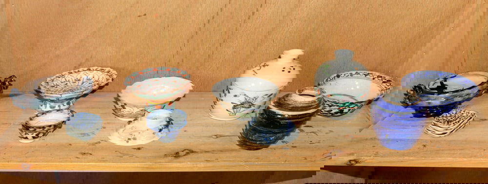 A shelf of Chinese ceramic objects: A shelf of Chinese ceramic objects. 19th century and later, 4.75" tallest.