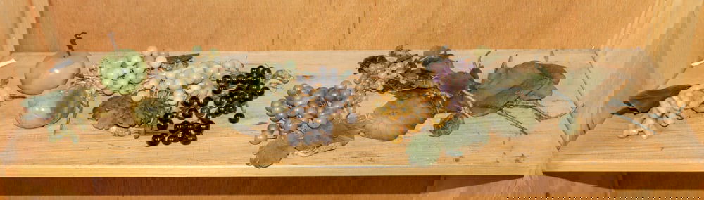 A group of Chinese hardstone fruits: A group of Chinese hardstone fruits. 20th century, 6.5" longest.