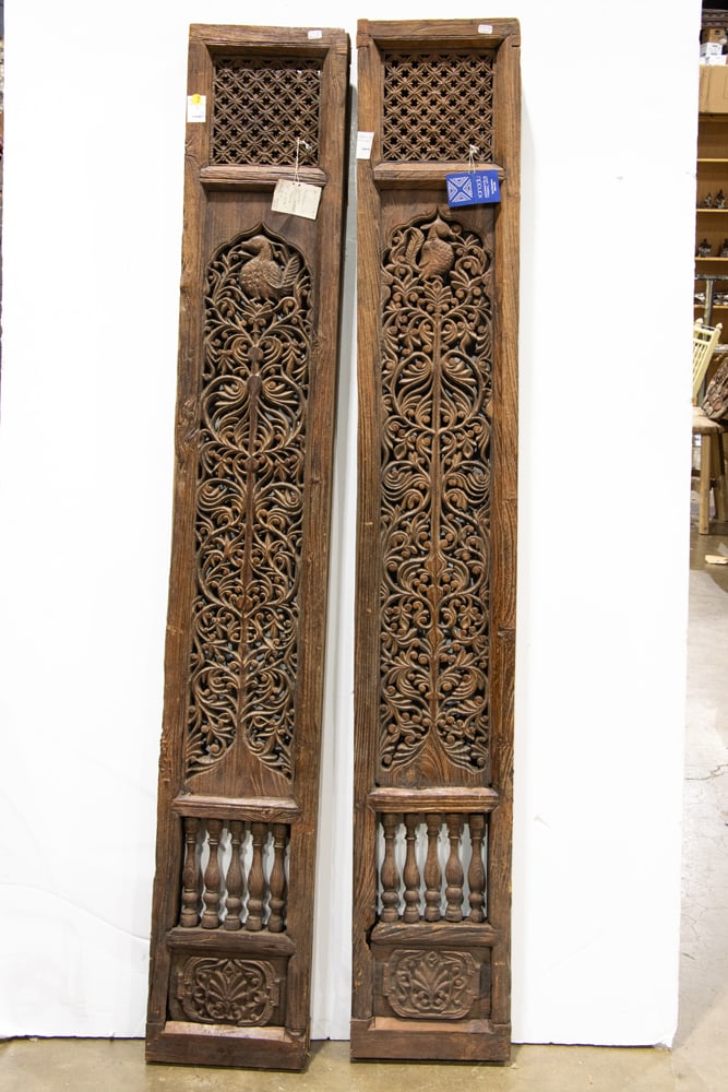 A pair of Indian carved wood windows: A pair of Indian carved wood windows. 18th century, 70"h x 11"w each.