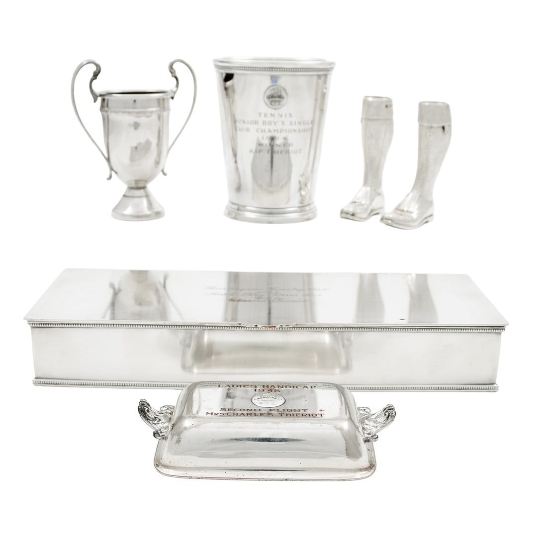 A whimsical pair of English sterling salt and pepper shakers in form of Scotsman legs: A whimsical pair of English sterling salt and pepper shakers in form of Scotsman legs, Theo Fennell, London, date code for 2023, 3.5"h, together with silverplate golf and tennis trophies including rec