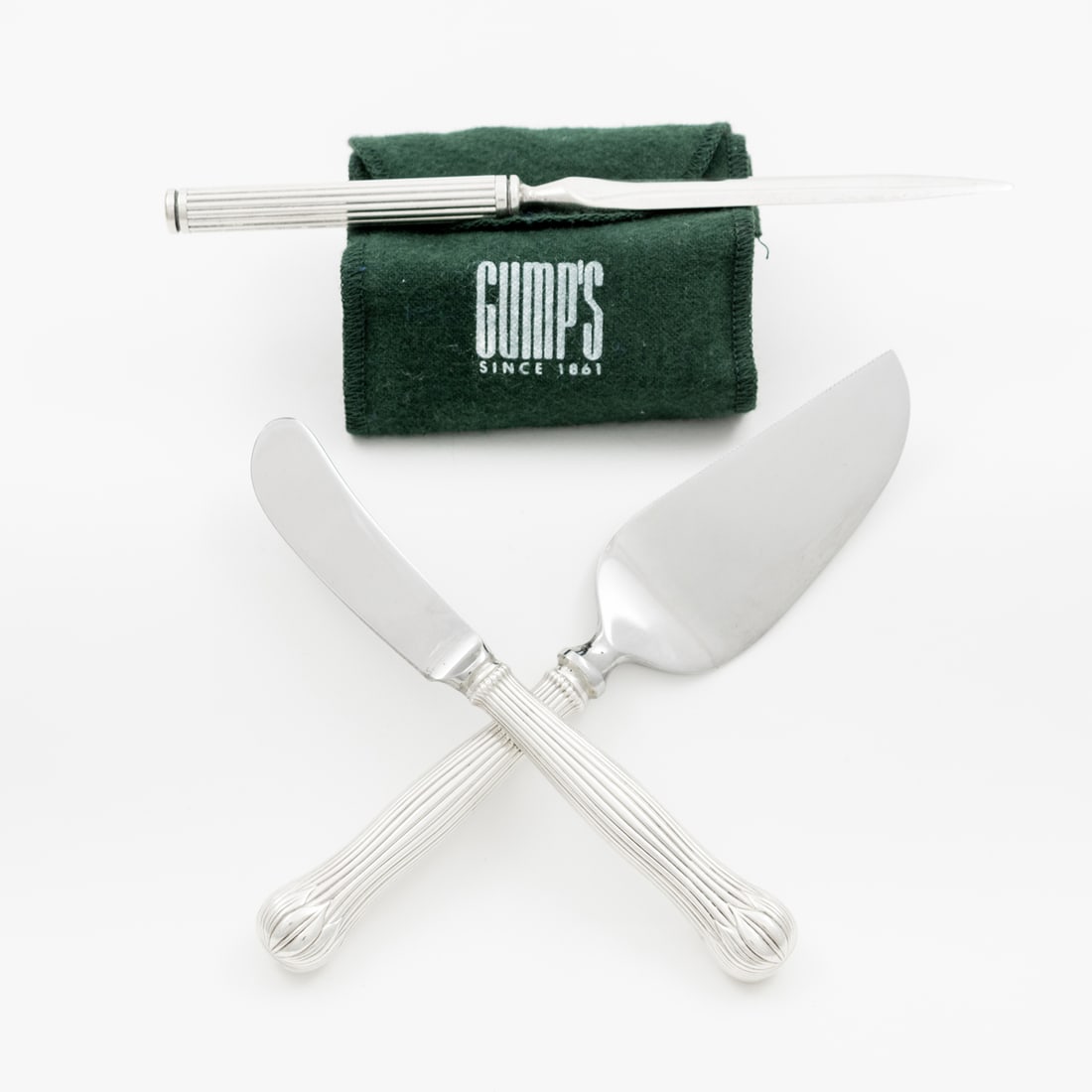 A Tiffany & Co. sterling silver handled cheese serving set in the Lotus pattern, knife 7.25"l; (1 of 3)