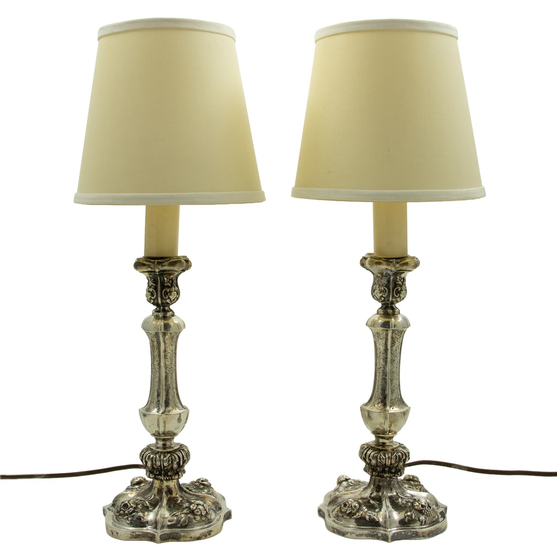 A pair of Vienna 800 standard silver candlesticks: A pair of Austrian, Vienna 800-standard silver candlesticks, circa 1847, now mounted as table lamps, 10.25"h excluding electrical components, 21.21 troy oz (gross)