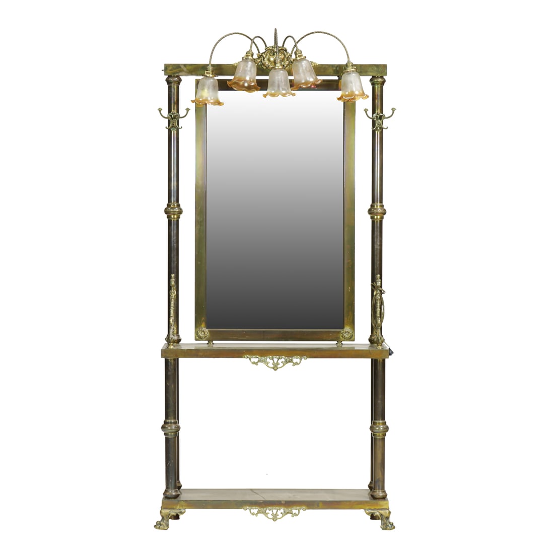 A Victorian style brass hall tree: A Victorian style brass hall tree, featuring beveled glass mirror plate, five lights with ruffled glass shades and integrated coat hooks, wired for electricity, 84"h x 40"w x 13"d