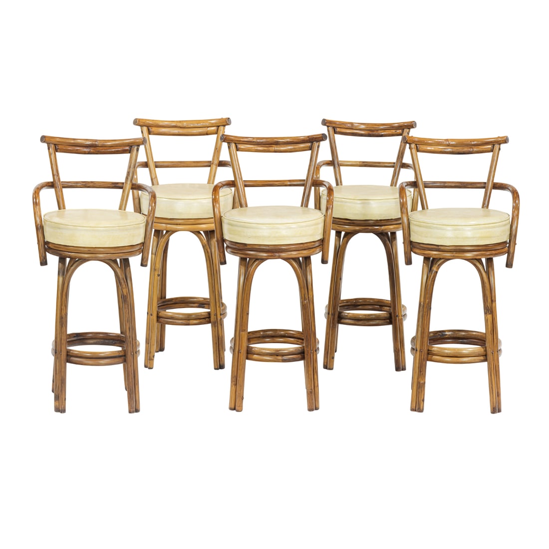 A set of five Kalp-Son Rattan Co. swivel bar stools: A set of five Kalp-Son Rattan Co. swivel bar stools, third quarter 20th century, factory paper label to underside, each with ivory vinyl padded seats, 41"h x 19"w; 30"h x 15.5"dia (seat)