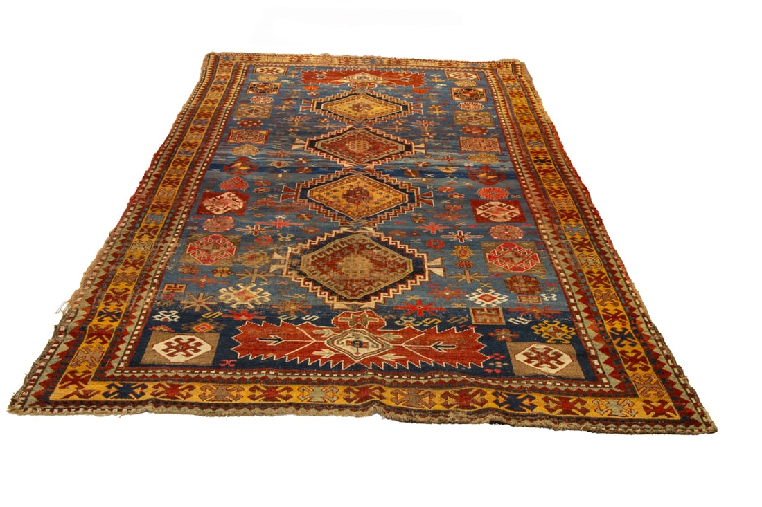 An antique Caucasian runner, 5'2" x 10'10" (1 of 3)