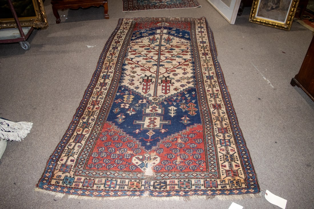 An antique Caucasian carpet (1 of 3)