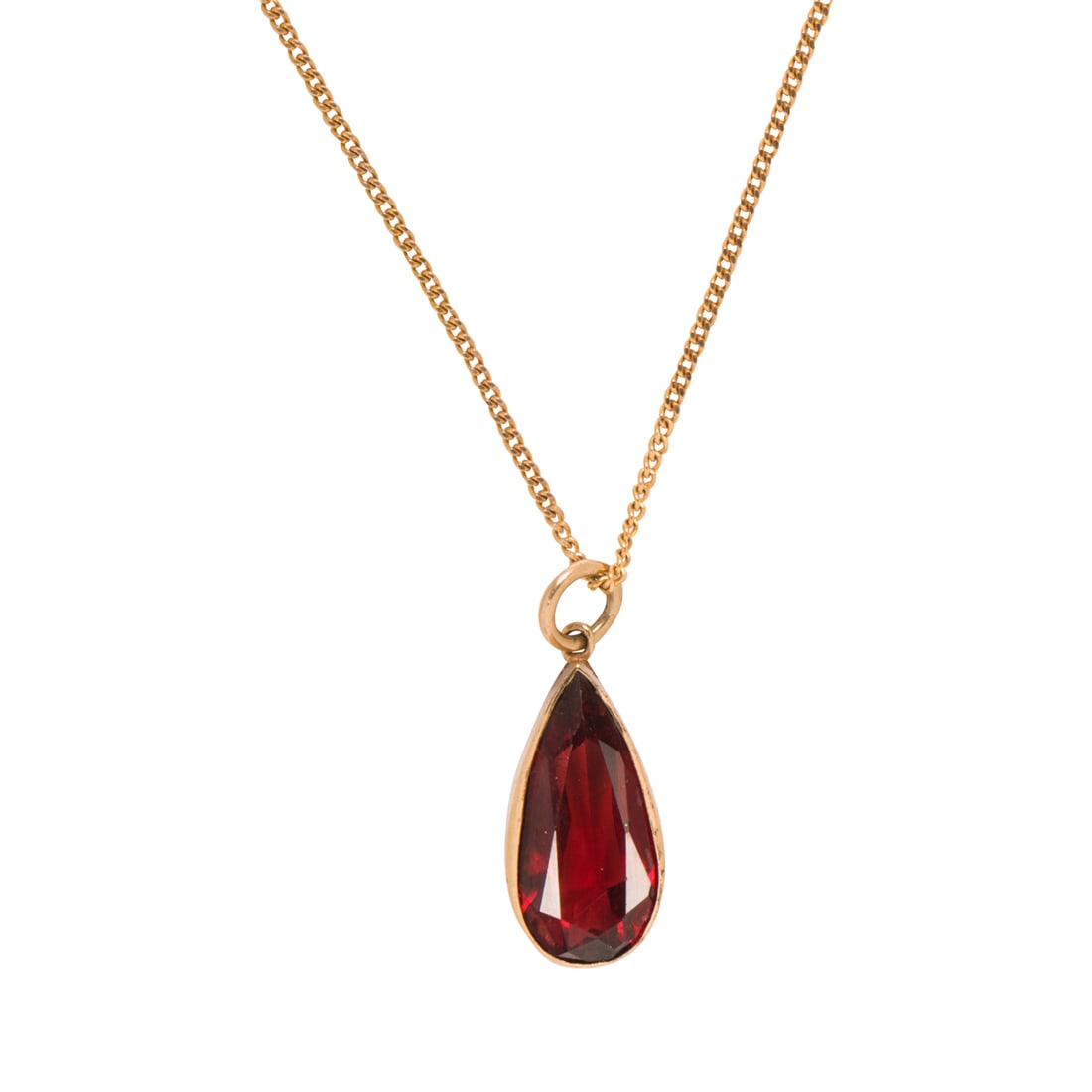 A red stone, 9k, and 10k gold pendant necklace: A red stone, 9k, and 10k gold pendant necklaceDesigned as a pear-cut red stone measuring 14.04 x 6.62 x 6.53 mm, framed within 10k gold bezel, on 9k gold curb-link chain; pendant length: 3/4 in; chain