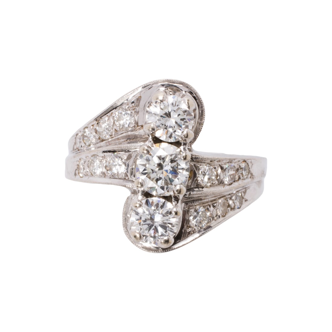 A diamond and 14k white gold ring: A diamond and 14k white gold ringOf bypass design, featuring a row of three round brilliant-cut diamonds weighing approximately 0.45 carat each, accented by 13 round brilliant-cut diamonds; estimated