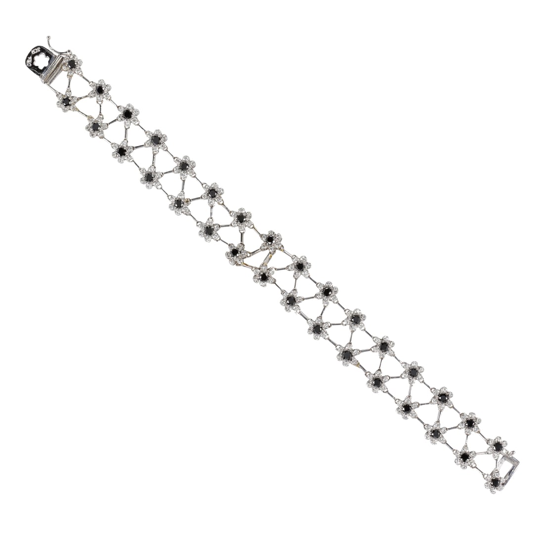 A diamond and 18k white gold bracelet: A diamond and 18k white gold braceletOf floriform design, featuring a lattice of 32 flowers each set with one round-cut black diamond with round brilliant-cut diamond surround; estimated total diamond
