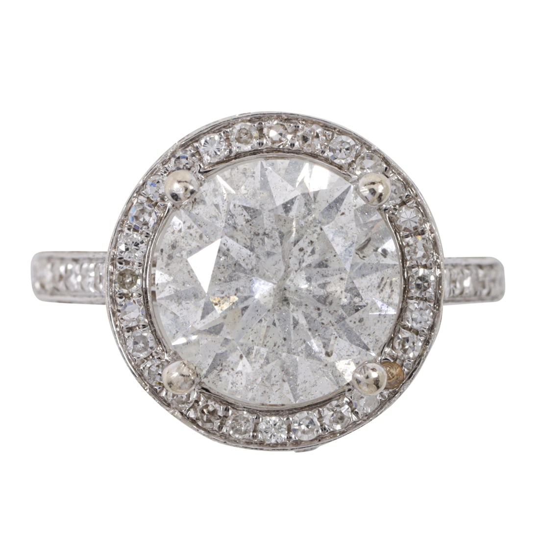 A diamond and 18k gold ring: A diamond and 18k gold ringcentering a round brilliant-cut diamond weighing approximately 3.00 carats, framed by round brilliant cut diamond with diamond set shoulders; estimated total diamond weight: