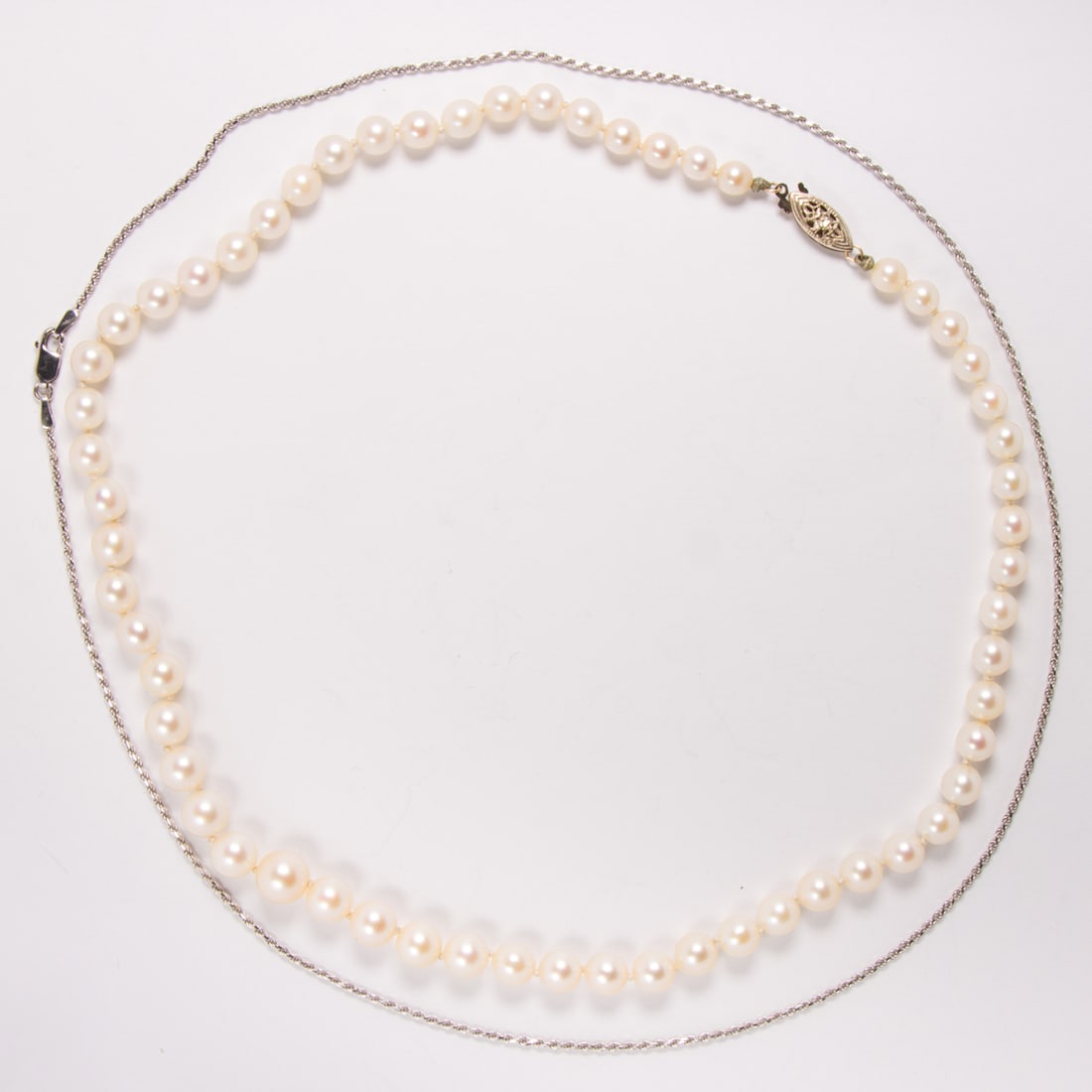 A cultured pearl and 14k white gold necklace and chain (1 of 2)