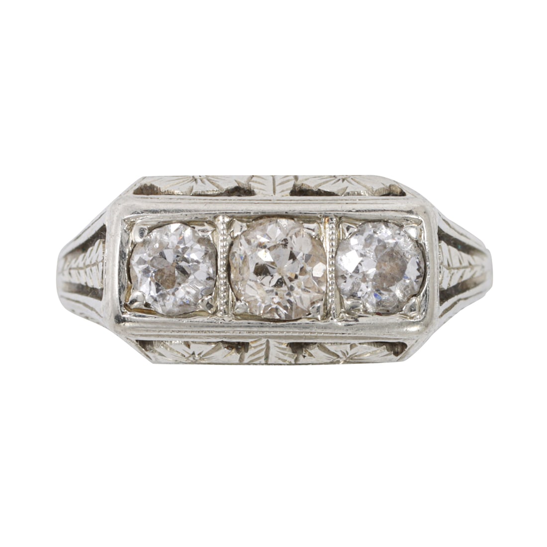 An Art Deco diamond and 18k white gold ring: An Art Deco diamond and 18k white gold ringFeaturing three old mine-cut diamonds, within open-form setting; size 3 1/2; 2.75 grams
