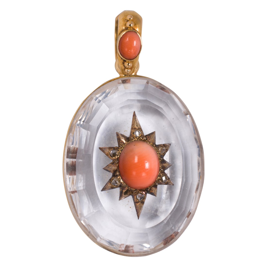 An antique rock crystal, coral, diamond, and 14k gold pendant: An antique rock crystal, coral, diamond, and 14k gold pendantDesigned as an oval-shaped, faceted rock crystal, centering a gold starburst design set with an oval-shaped coral cabochon measuring 8.82 x