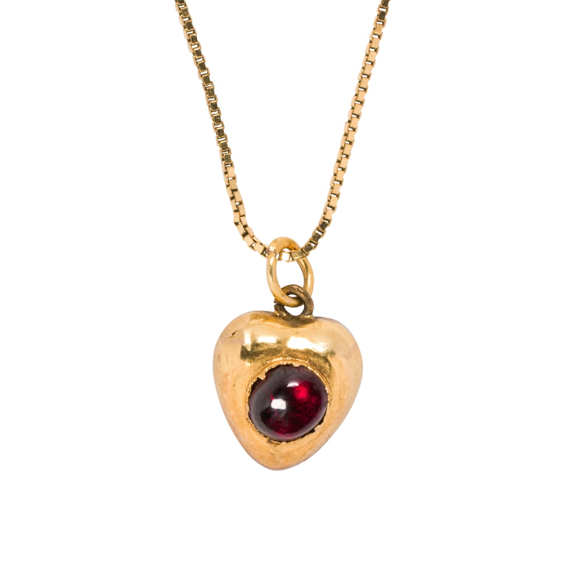 An antique red stone, 14k, and 9k gold hair locket necklace: An antique red stone, 14k, and 9k gold hair locket necklaceDesigned as a heart, set with one round shaped, foil-backed red stone cabochon measuring 5.43 mm, containing a lock of hair, on modern 9k gol