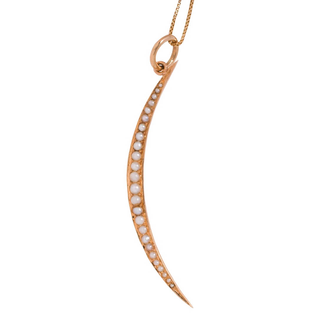 A seed pearl and 14k gold pendant necklace: A seed pearl and 14k gold pendant necklaceOf crescent design, accented by seed pearls, on box chain; pendant length: 2 1/2 in; chain length: 23 in; 4.35 grams