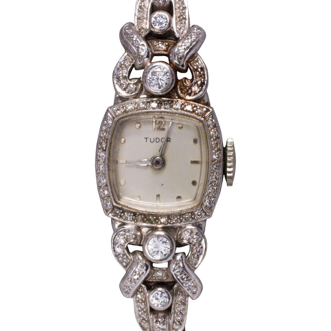 A Tudor diamond and 18k white gold cocktail watch: A Tudor diamond and 18k white gold cocktail watchCase no.: 28717The silver-tone face, silver-tone mixed indices, silver-tone lance hands, within polished 18k white gold case set with 112 single and ro