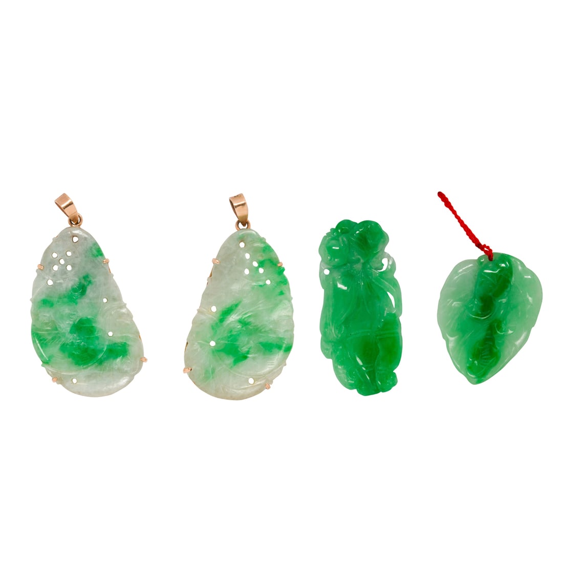 Four jade and 14k gold pendants (1 of 3)