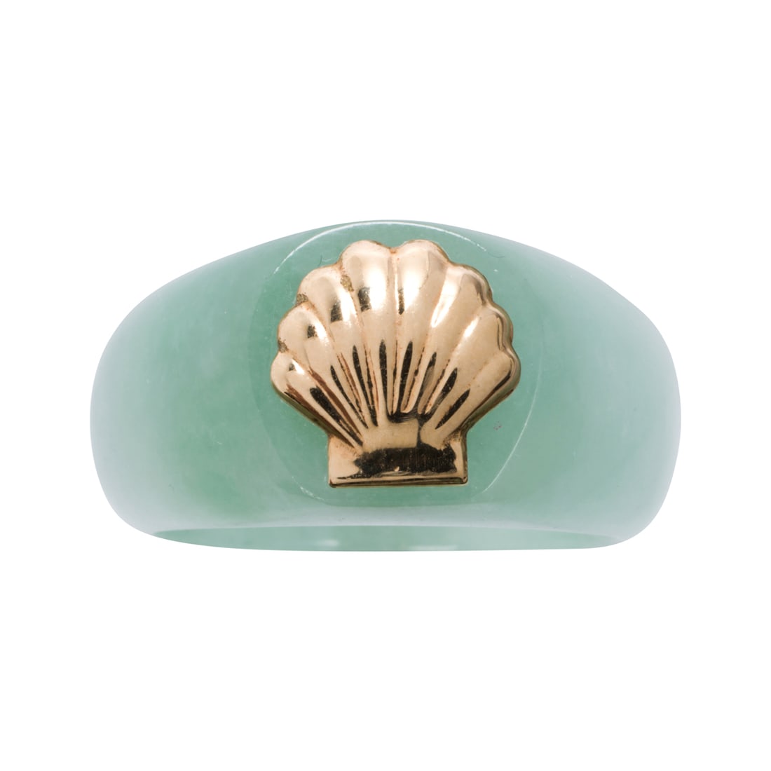 A jadeite and 14k gold ring: A jadeite and 14k gold ringcomprised of a carved jadeite hololith band centering a gold scallop shell ornament; 8.10 grams; size: 10