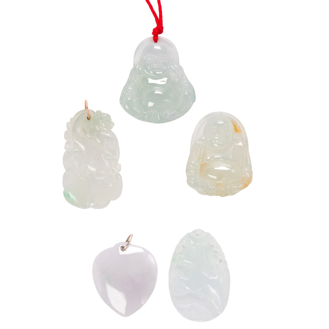 Five ice jade pendants: Five ice jade pendantsthe ice jade pendants depicting the Buddha, a tiger, a horse, and a heart, including one with 14k gold bail; gross weight: 34.95 grams