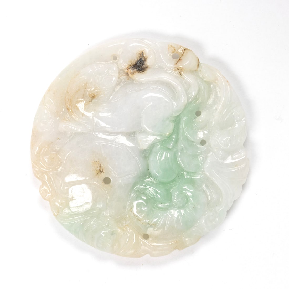 A jade and 10k gold Buddha pendant: A jade and 10k gold Buddha pendantDepicting the Buddha, on 10k gold bail; length: 2 1/4 in; 12.55 grams