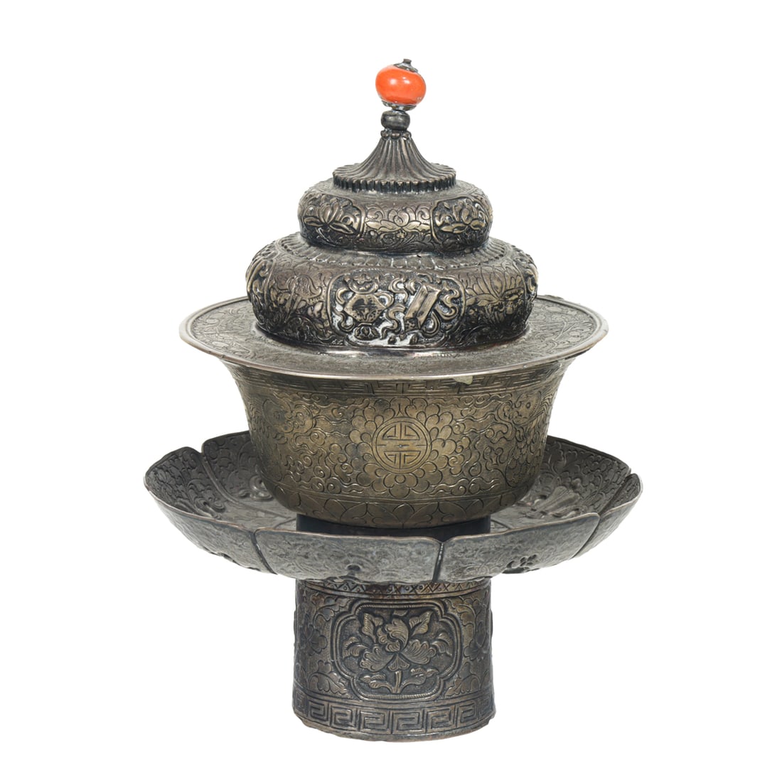 A Tibetan silver offering cup and stand: A Tibetan silver offering cup and stand. 186 grams of total weight, 5.5" high.