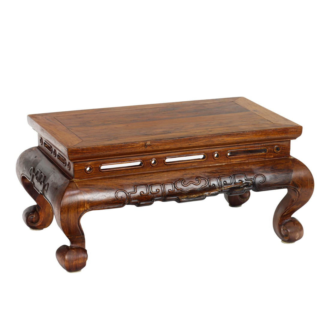 A Chinese huanghuali rectangular low table: A Chinese huanghuali rectangular low table. 20th century, 8.375"h x 16.5"w x 9.75"d.