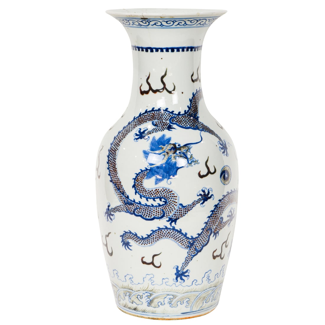 A Chinese blue and white and underglaze copper-red 'dragon' vase: A Chinese blue and white and underglaze copper-red 'dragon' vase. Depicting five-claw dragon writhing amidst flaming pearls, above a band of crested waves. late Qing period, 18" high. Provenance: A. B