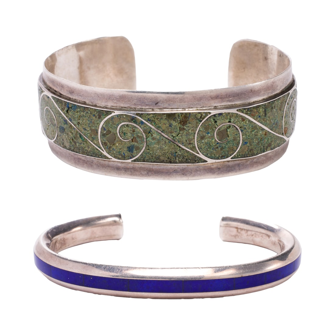 Two hardstone and sterling silver cuff bracelets: Two hardstone and sterling silver cuff braceletsComprising one bangle inlaid with mixture of crushed turquoise, azurite, malachite and onyx; marked "JBR", and a bangle inlaid with lapis lazuli;