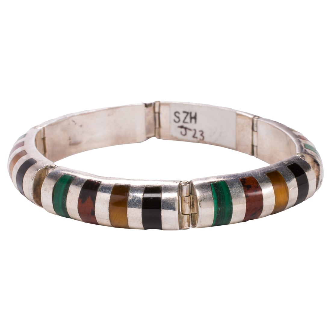 A hardstone and silver bracelet: A hardstone and silver braceletinlaid with tigers eye, onyx, malachite and bloodstone; 35.10 grams; length: 7 1/2 in;