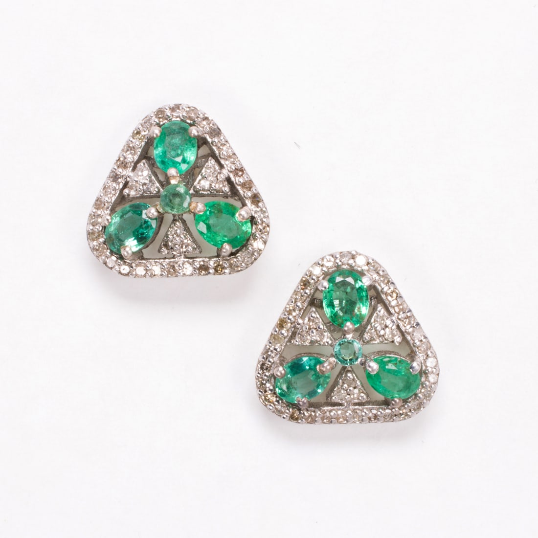 A pair of emerald, diamond, and silver earrings (1 of 1)