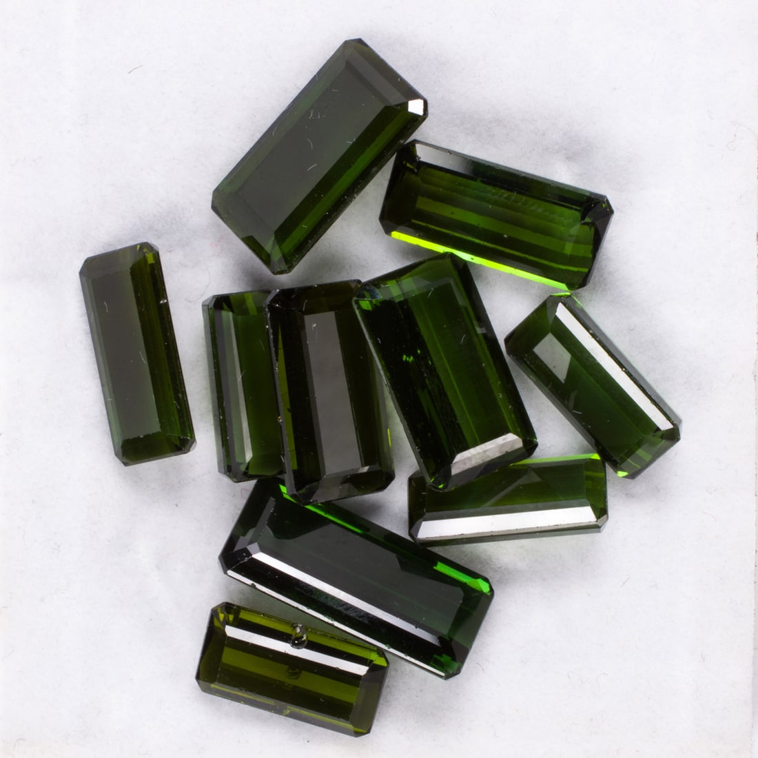 A group of ten unmounted tourmalines: A group of ten unmounted tourmalinesof varying sizes; weighing in total approximately 59.67 carats