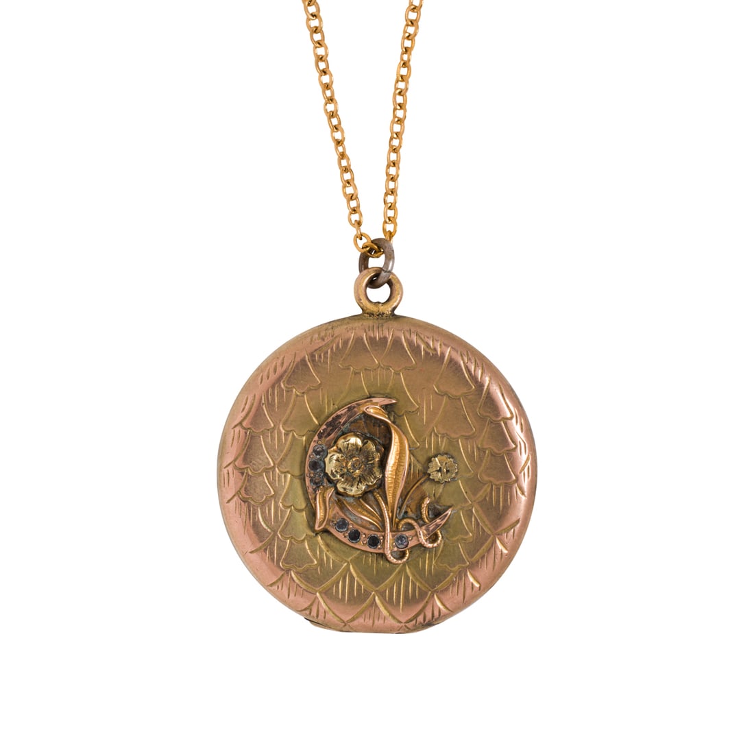 A Victorian gold-filled locket necklace: A Victorian gold-filled locket necklaceThe locket designed with an ornate crescent and flower design, set with seven round-cut transparent stones, accompanied by modern gold-filled chain; locket