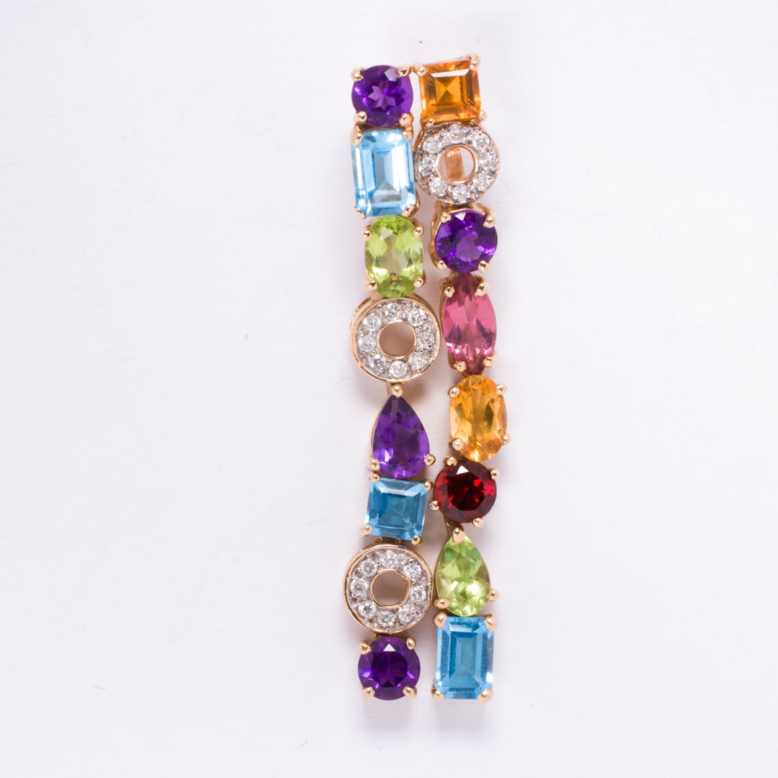 A diamond, gemstone, and 14k gold pendant: A diamond, gemstone, and 14k gold pendantDesigned as two lines of topaz, amethyst, rose quartz, citrine, peridot and garnet, accented by discs of round brilliant-cut diamonds; 6.0 grams; length: 2 in