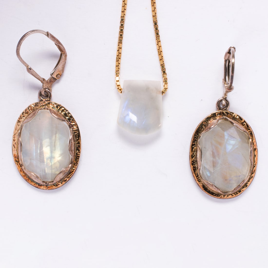 A moonstone, silver, and 14k gold necklace and pair of earrings (1 of 1)