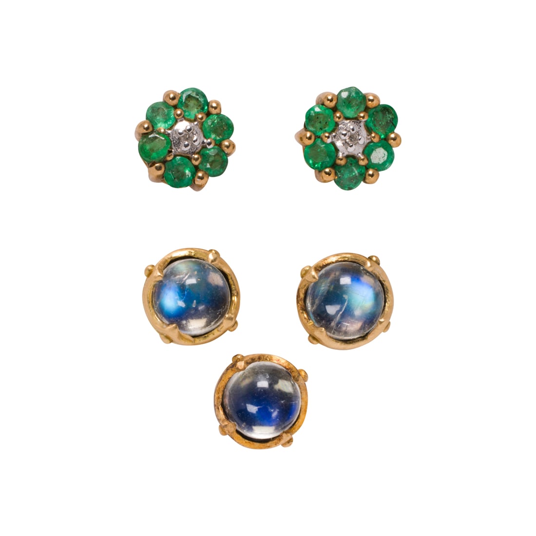 Two pairs of gold stud earrings: Two pairs of gold stud earringsComprising three moonstone and 14k gold stud earrings, together with a pair of green stone and 9k gold flower studs; gross weight: 3.25 grams